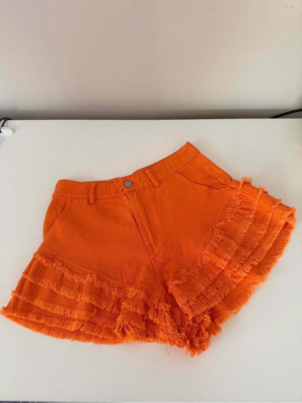 Vestique Fringed Orange Shorts